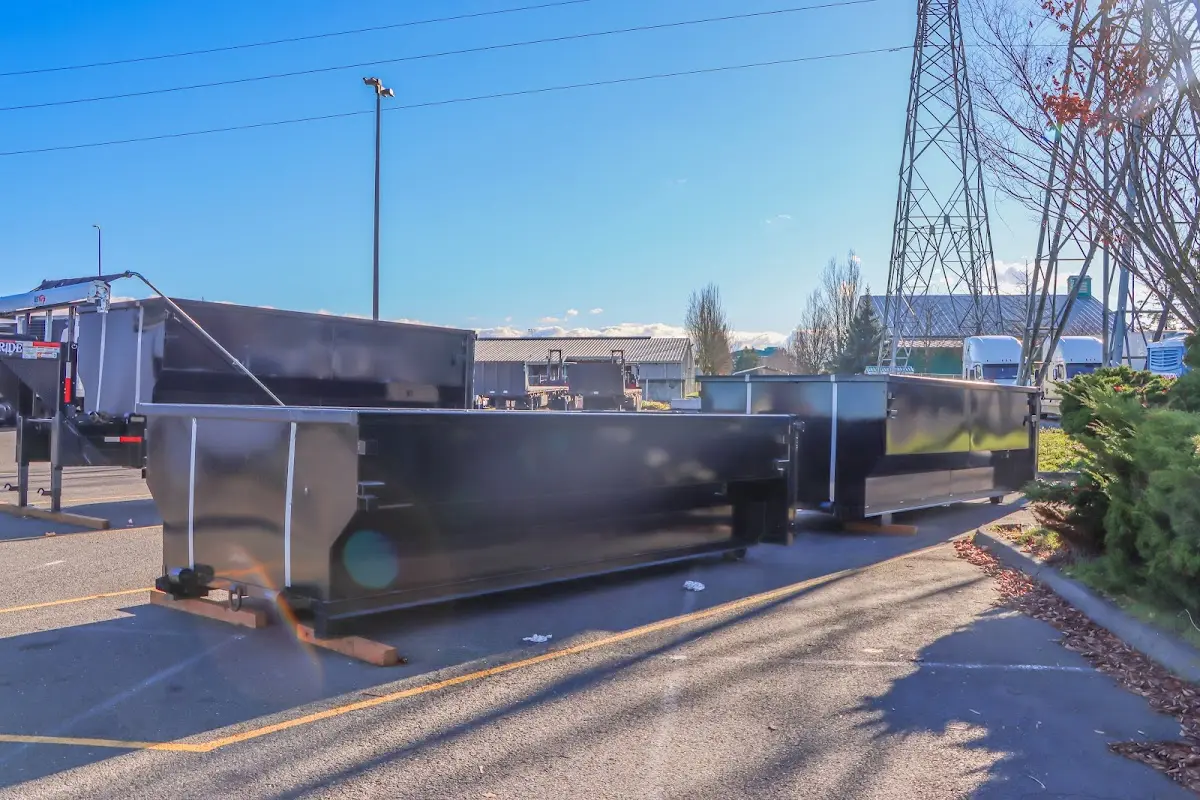 Roll-off dumpster ready for waste disposal at job site for Demolition Dumpster Rental in Seneca Falls